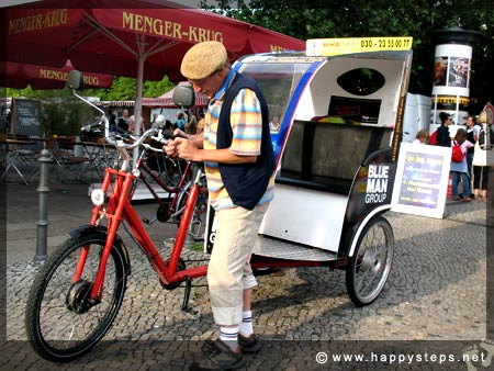 Photo of bicycle for hire at an open-air art market, Berlin