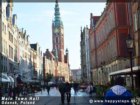 Walking along the Long Lane with the Main Town Hall seen ahead, in Gdansk, Poland